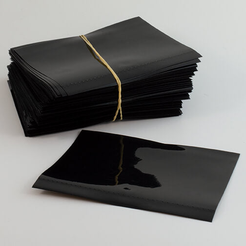 68 x 90 (mm) Black Flat Cut Shrink Bands, Single Vertical Perforations (FITS 38mm - 41mm Cap Sizes)